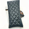 Black quilted PU leather eyeglass case with a brown patterned cleaning cloth