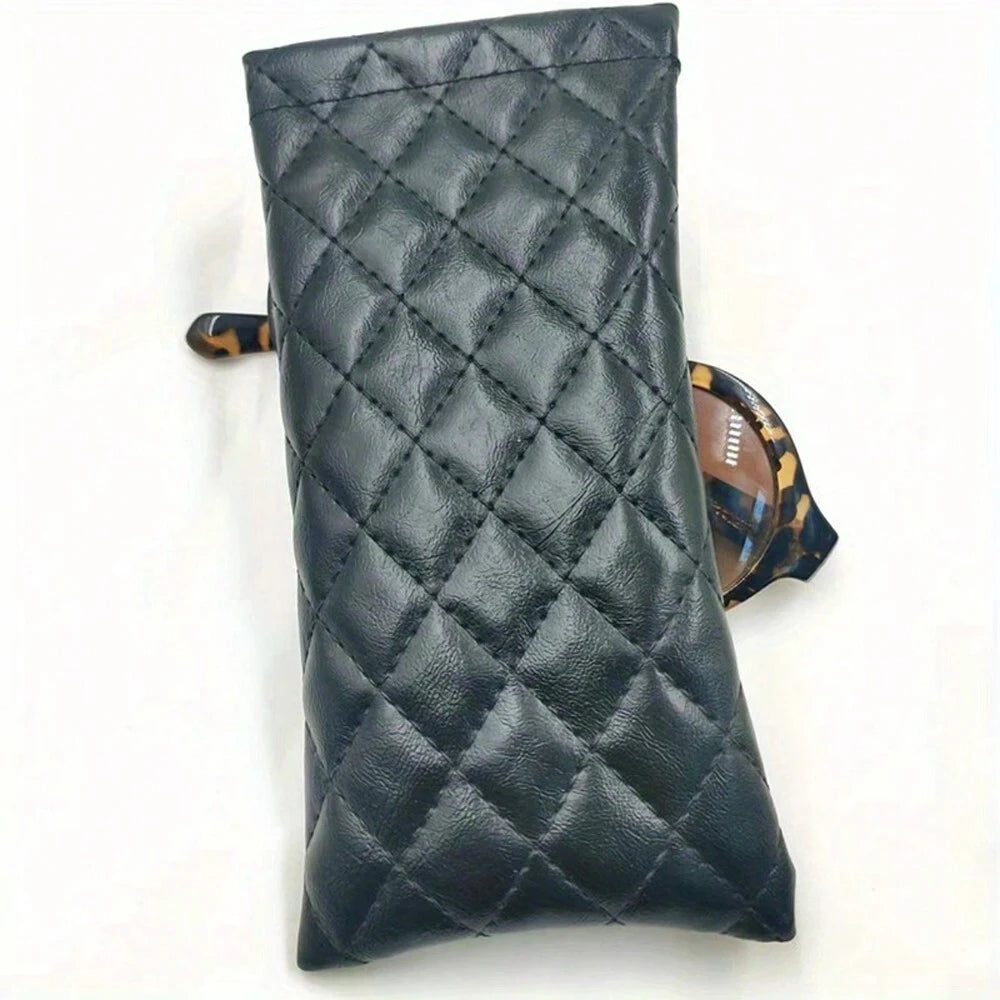 Black quilted PU leather eyeglass case with a brown patterned cleaning cloth