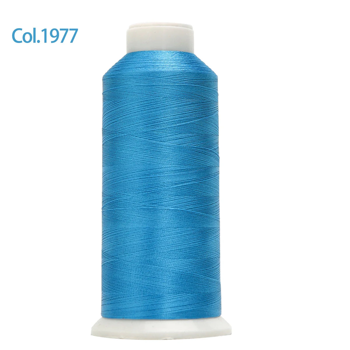 A spool of bright blue embroidery thread labeled Col.1977