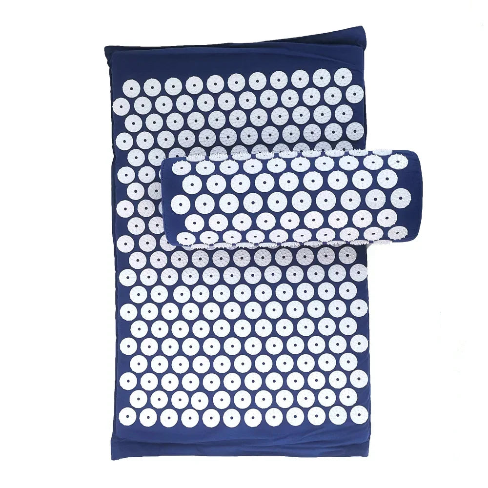 A dark blue acupressure relief mat and pillow set featuring a grid of white massage balls.