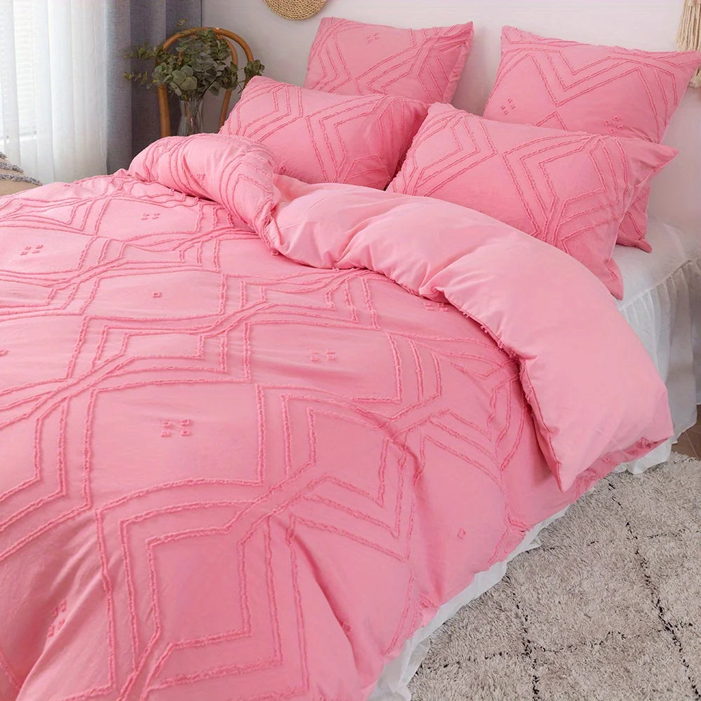 Pink bohemian grid tufted duvet cover set with matching pillows and a pink duvet