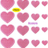A collection of 24 pink iron-on love heart embroidered patches in various shades and sizes.