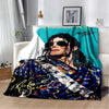 A retro printed flannel throw blanket featuring a portrait of a man with long dark hair and sunglasses against a vibrant teal