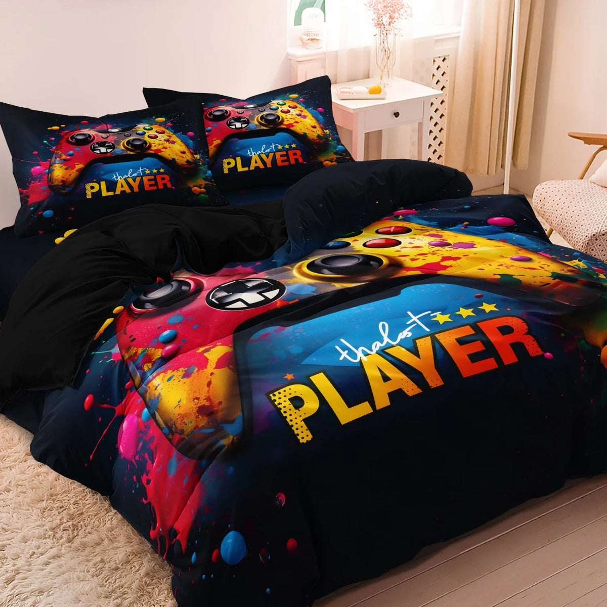 A dark blue duvet cover featuring a vibrant yellow and red gamer theme with the text PLAYER