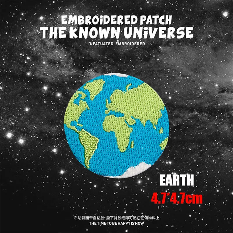 Embroidered patch featuring a globe of Earth against a starry background.