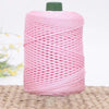 Pink 3mm ice rope crochet yarn wound tightly on a green bobbin for crafting