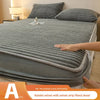 A rabbit velvet milk velvet strip fitted sheet gray bed sheet being touched on a bed
