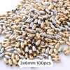 A pile of mixed gold and silver geometric acrylic beads for jewelry making