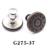 A silver adjustable button pin with a round, engraved surface featuring the text WEAR JEANS