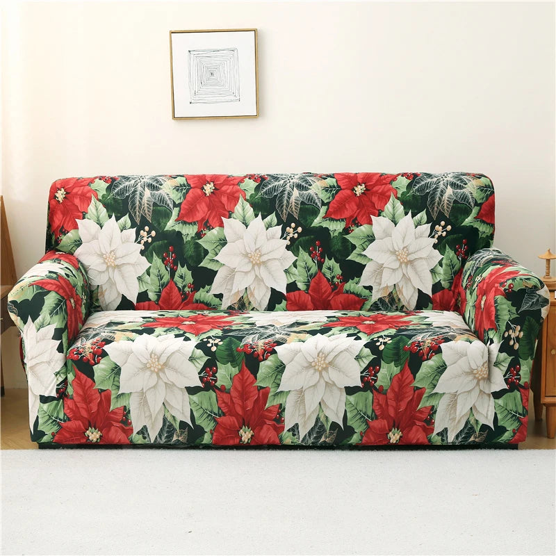 A floral patterned sofa cover featuring red leaves and white flowers on a light background.