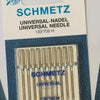 A packet of Schmidt universal sewing machine needles labeled 130/705 H and 90/14.