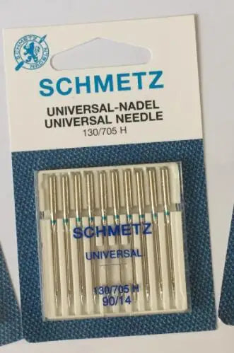 A packet of Schmidt universal sewing machine needles labeled 130/705 H and 90/14.