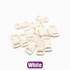 A collection of white adjustable plastic paracord buckle bracelets laid out on a white background.