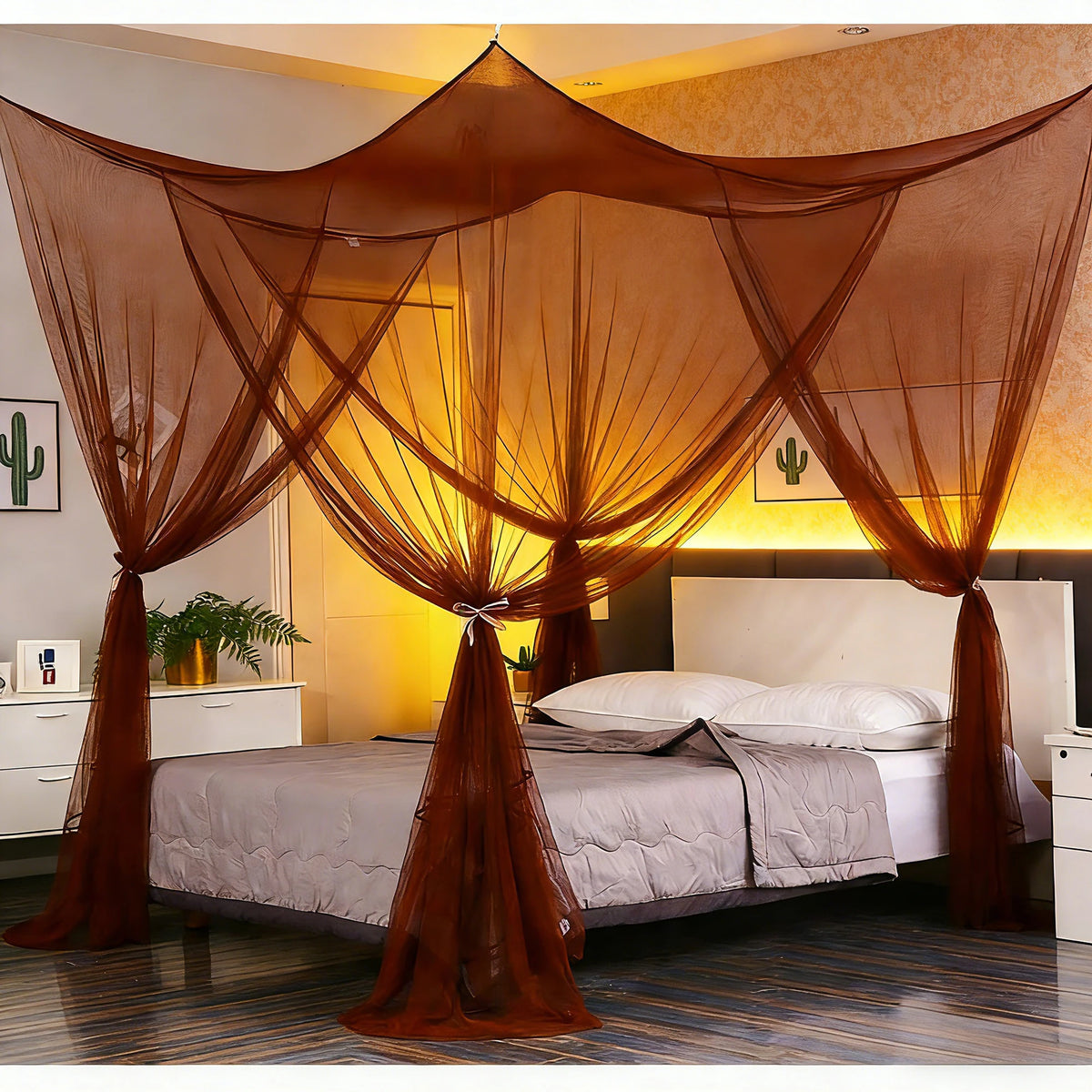 A square mosquito net bed canopy in brown fabric draped over a bed in a bedroom.