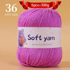 A skein of 36 soft purple yarn, labeled as handmade knitting thread, is shown on a light background.