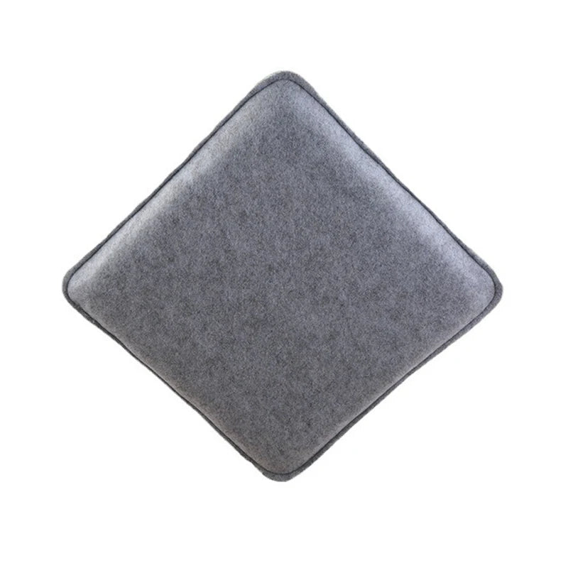 A square, gray needle felting mat pad.