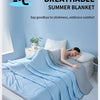 A light blue breathable summer blanket draped over a person lying in bed.