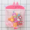 A pink mesh storage bag shaped like a cat is filled with colorful bath toys and accessories.