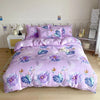 A purple marble print duvet cover set with matching pillowcases displayed on a bed.