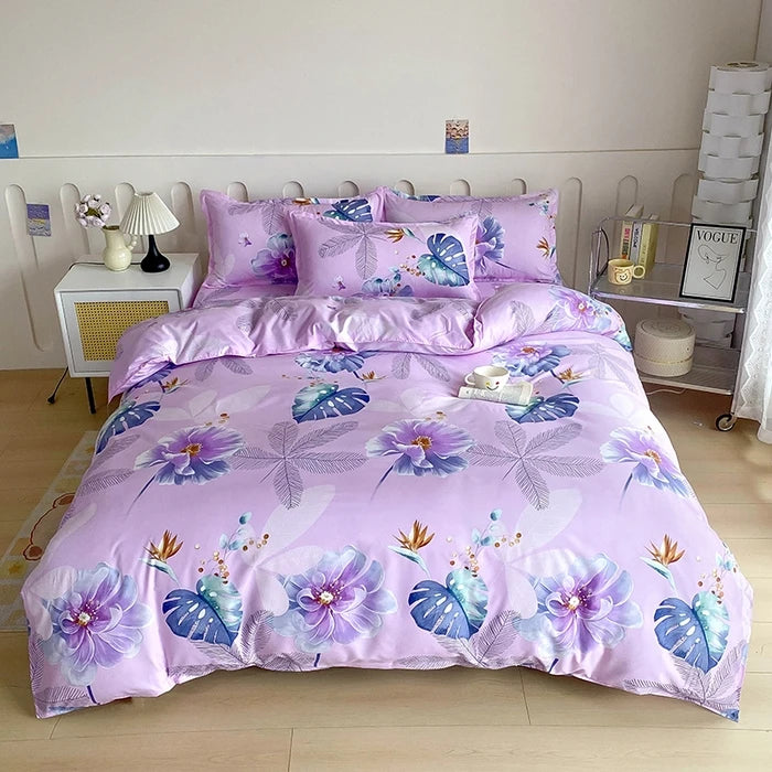 A purple marble print duvet cover set with matching pillowcases displayed on a bed.