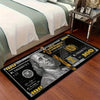A black mat featuring a funny dollar print of a 100 dollar bill for an entryway or kitchen.