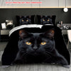 A black cat face design printed on a dark fabric used as a pillow cover or blanket.