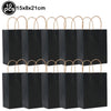 Ten black rectangle tablecloths with natural twine handles.