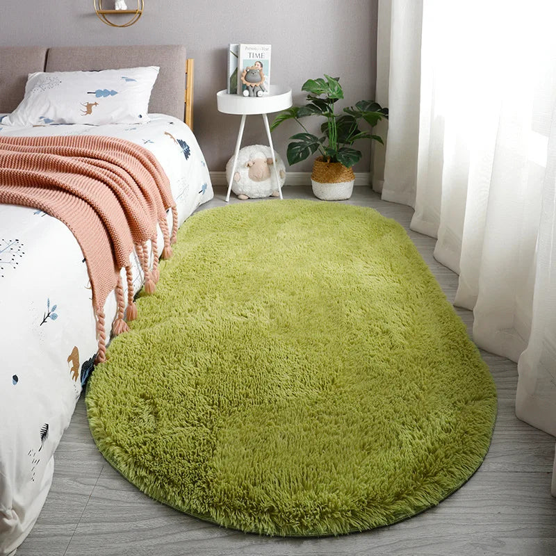 A bright lime green plush floor mat placed on a light gray floor next to a bed.