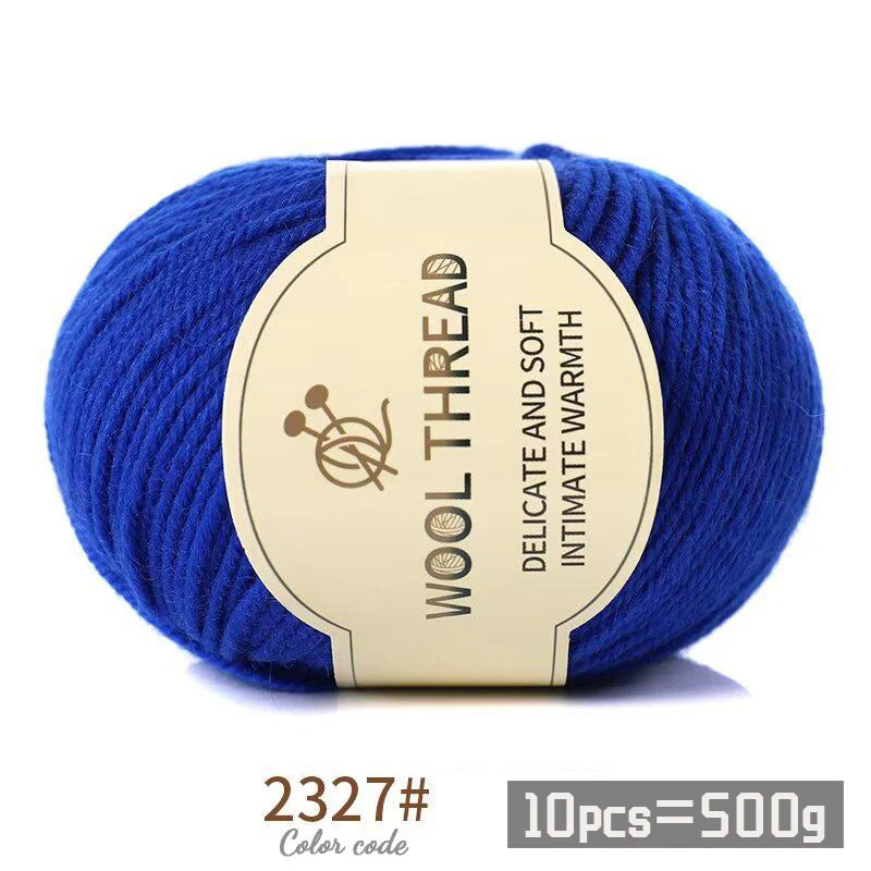 Blue wool thread skein with a label indicating delicate and soft intimate warmth