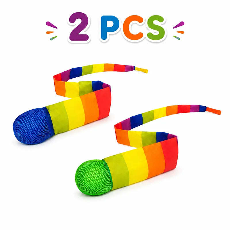 Two rainbow colored comet balls with soft tails are displayed on a white background.