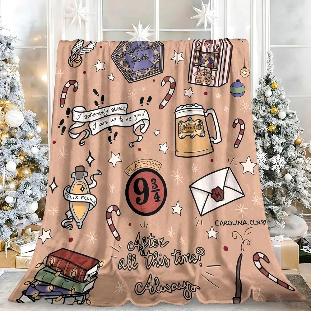 A beige flannel throw blanket featuring various illustrations and text on a light background.