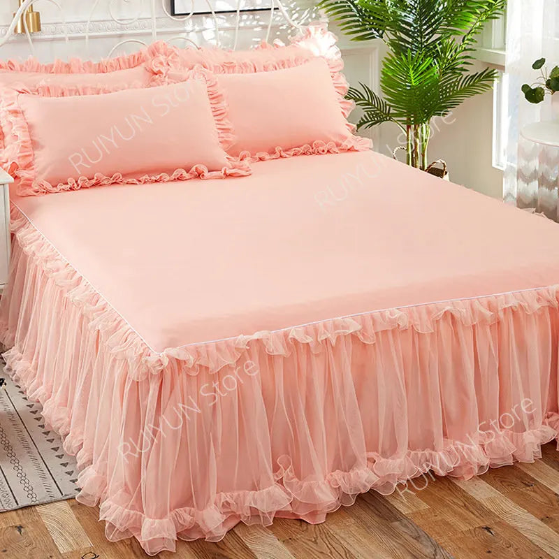 Pink princess lace bed skirt set with a light pink duvet and pillows
