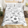 A duvet cover featuring hand-drawn black and white football doodles and soccer themes.