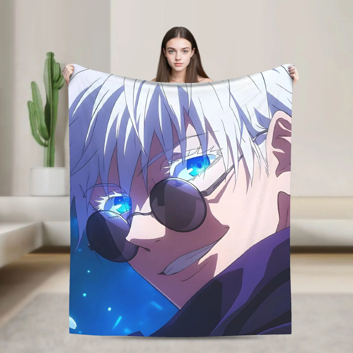 A flannel throw blanket featuring an anime-style illustration of Gojo Satoru with blue eyes and white hair.
