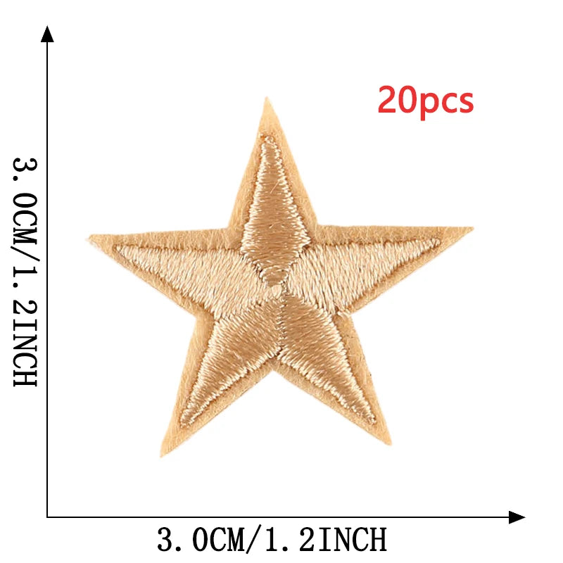 A single tan five-pointed star embroidery patch is shown against a measurement scale.
