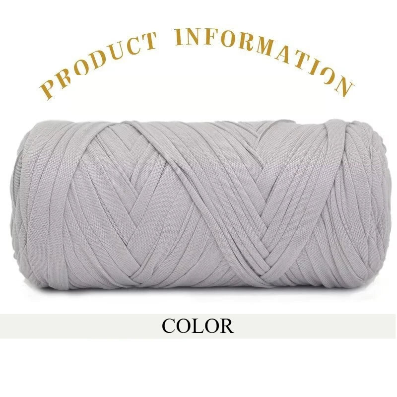A tightly wound skein of thick, light gray polyester blended yarn for crafting.