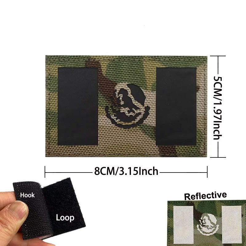 A rectangular camouflage fabric patch with two black rectangles and a circular embroidery patch, shown next to a hook and loo