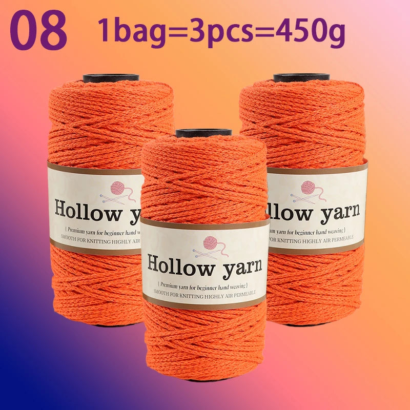 Three spools of orange hollow yarn for knitting and crochet, totaling 450g.