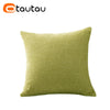 A square olive green linen cushion cover with a button closure.