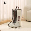 A beige waterproof foldable boots storage bag standing on a round rug.