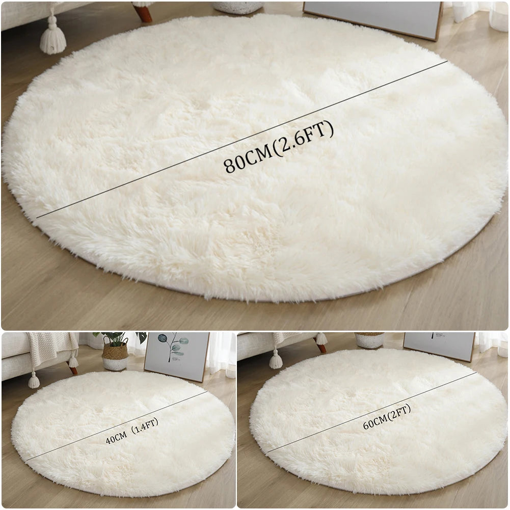 A collection of round, white shaggy area rugs shown from different angles and sizes.