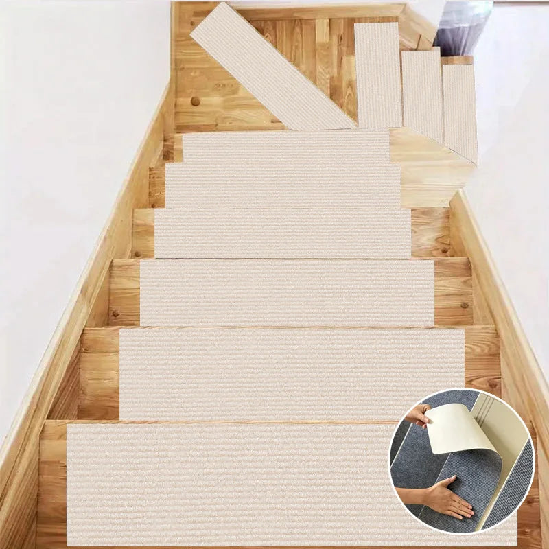 A set of self-adhesive stair and door mats in beige and natural wood tones installed on a wooden staircase.