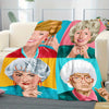 A blanket featuring four portrait illustrations of elderly women in retro pop art style.