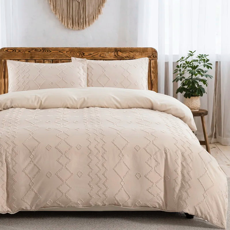 A beige boho tufted microfiber duvet cover set displayed on a wooden bed with sheer curtains and a potted plant.