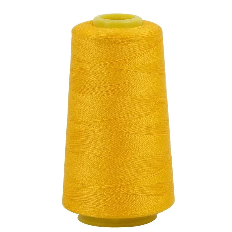 A bright yellow spool of premium sewing thread.