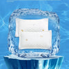 A white cooling pillow is encased in ice within a blue water background.