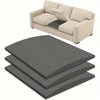 A beige sofa cushion repair pad is shown next to a stack of dark gray, rectangular pads.
