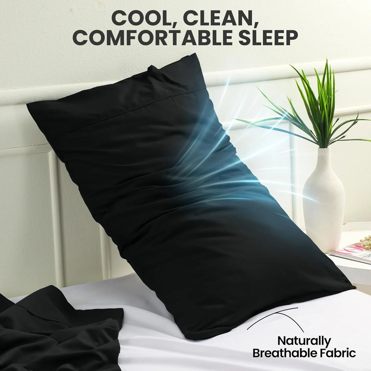 A black microfiber pillow cover is shown on a white bed, emphasizing cool, clean, and comfortable sleep.