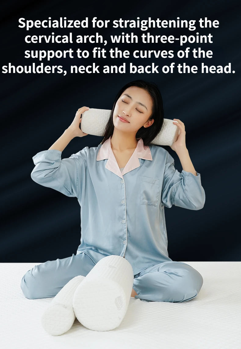 A woman is using a memory foam neck roll pillow for support and relaxation, demonstrating its use on the shoulders, neck, and