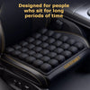 Black seat cushion with numerous air cells designed for people who sit for long periods of time